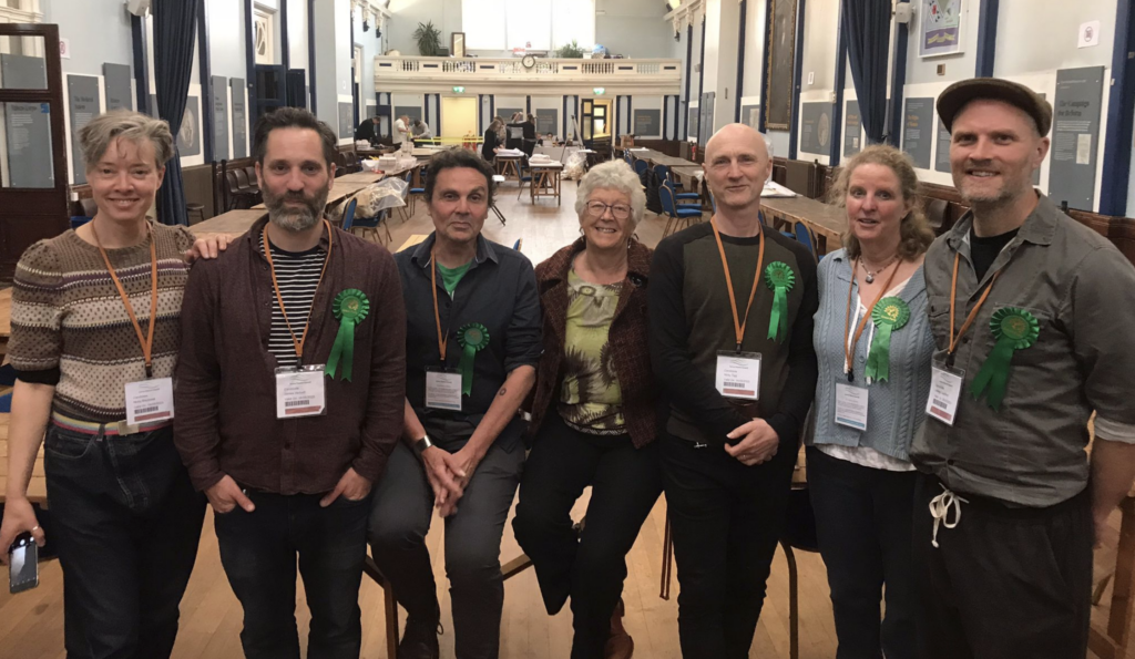 In this photograph taken in Lewes Town Hall we see newly elected Town councillors: Nicky Blackwell, James Herbert, Matthew Bird, Imogen Makepeace, Nick Tigg, Wendy Maples and James Gardiner.